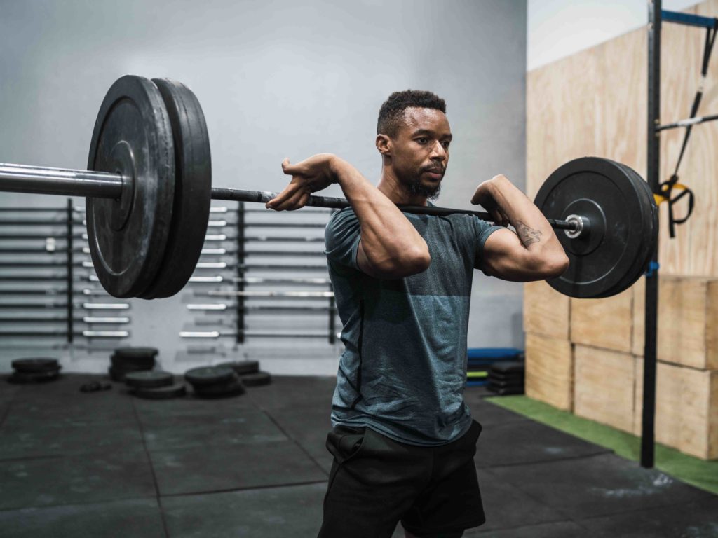 Gym hack man lifting barbell