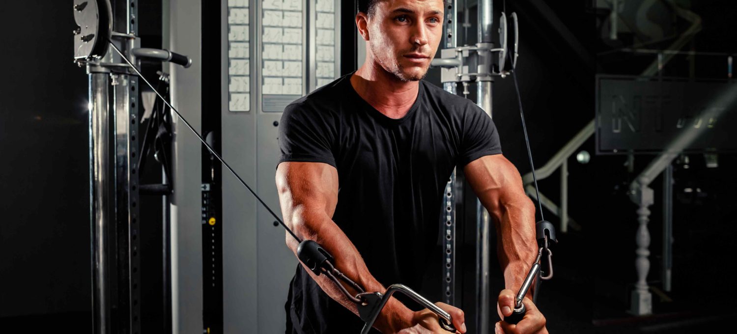 cable machine man gym muscle chest arms