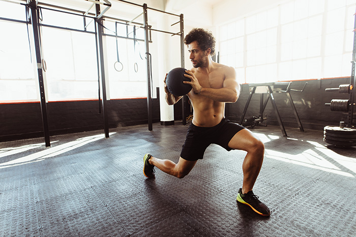 Lean muscle man in gym workout motivation determination success