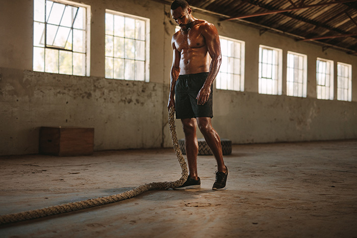 Man gym workout Build muscle burn body fat training tips fitness advice