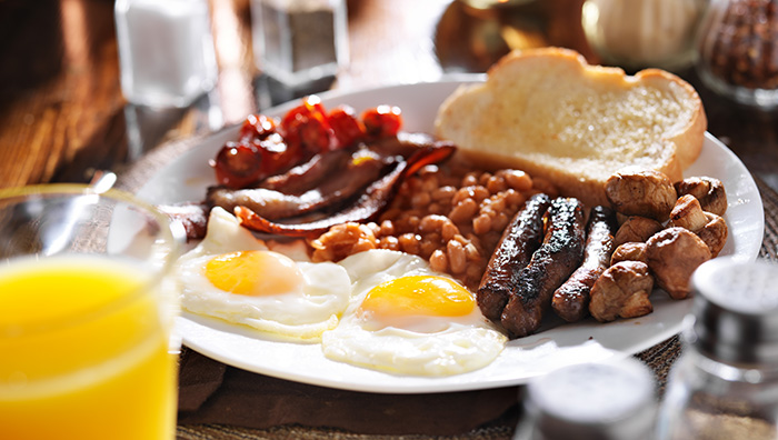 Healthy fry-up high fat food eggs breakfast brunch meal