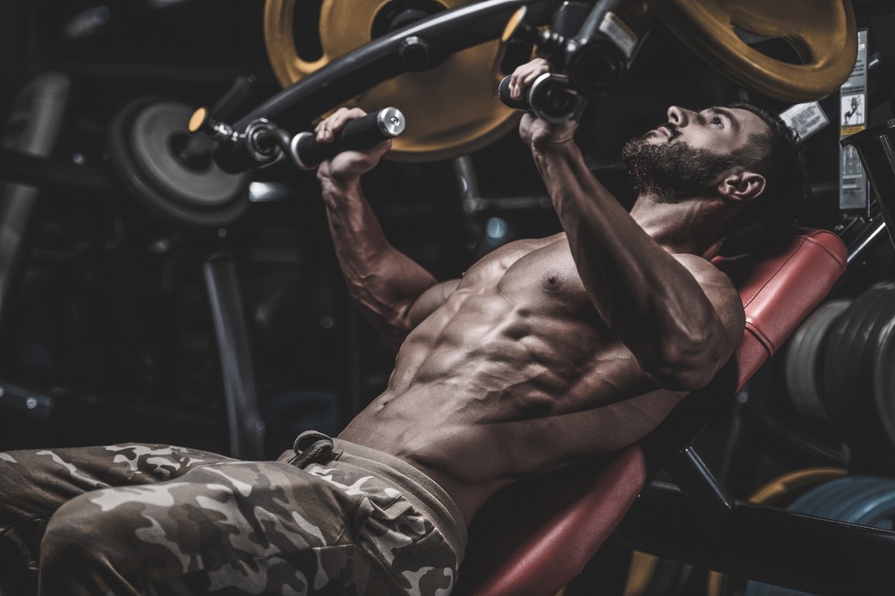 How to use the chest press machine to build a bigger and stronger chest