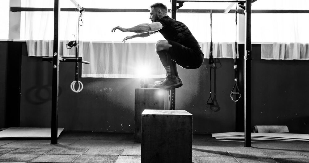 box jumps plyometric training man gym workout speed power muscle jumping